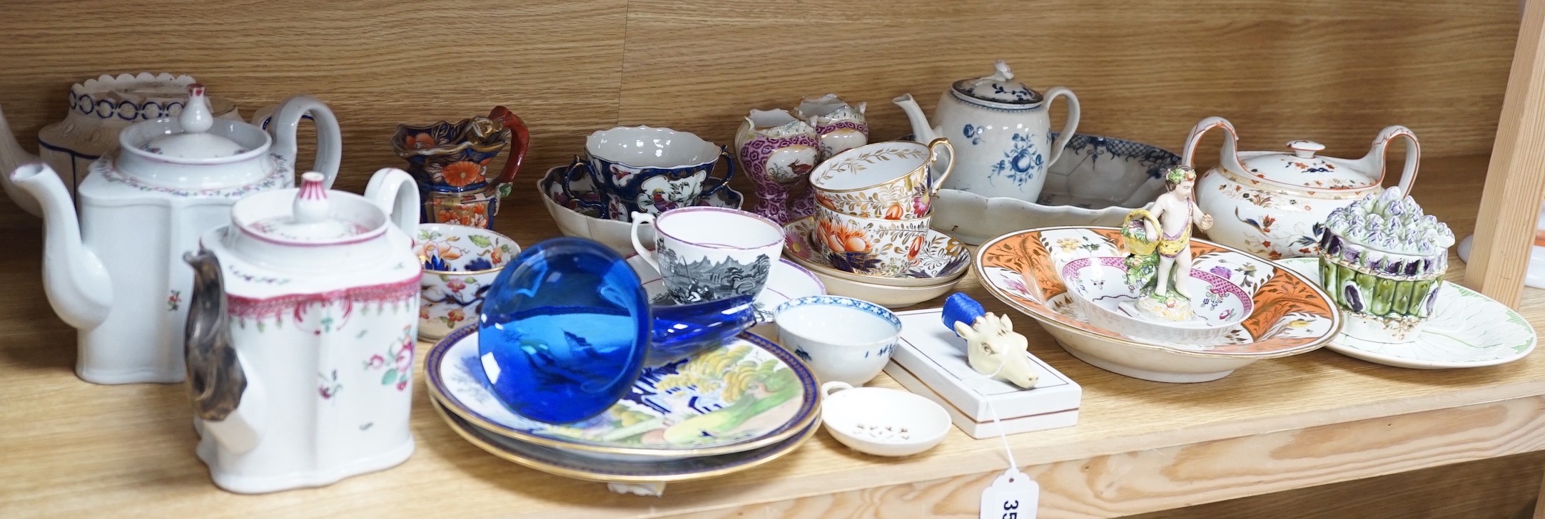 A collection of late 18th/19th century English ceramic teapots, cabinet cups, a jug, dishes and plates etc